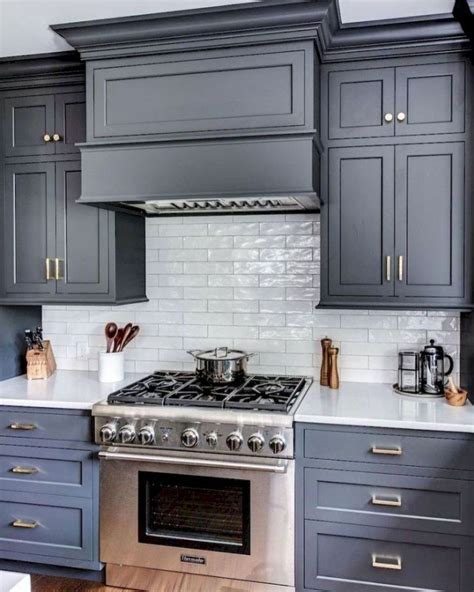 grey cabinets with cisland cook top steel knobs|grey kitchen cabinet ideas.